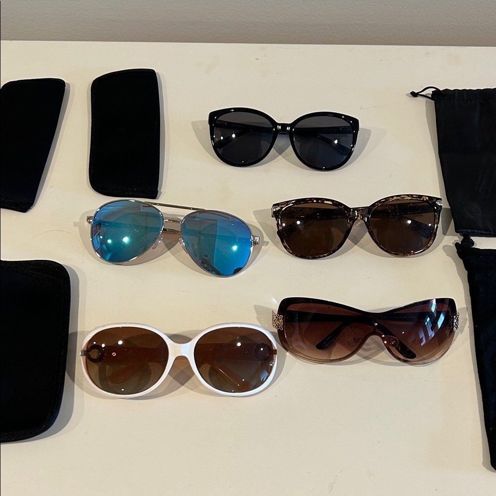 Lot of 5 pairs of sunglasses. Various brands.